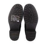 UGG black boot outsoles with tread pattern and logo embossed