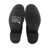 UGG black boot outsoles with tread pattern and logo embossed
