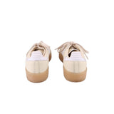 Pair of cream ADIDAS Samba sneakers, back view with heel tabs and gum sole