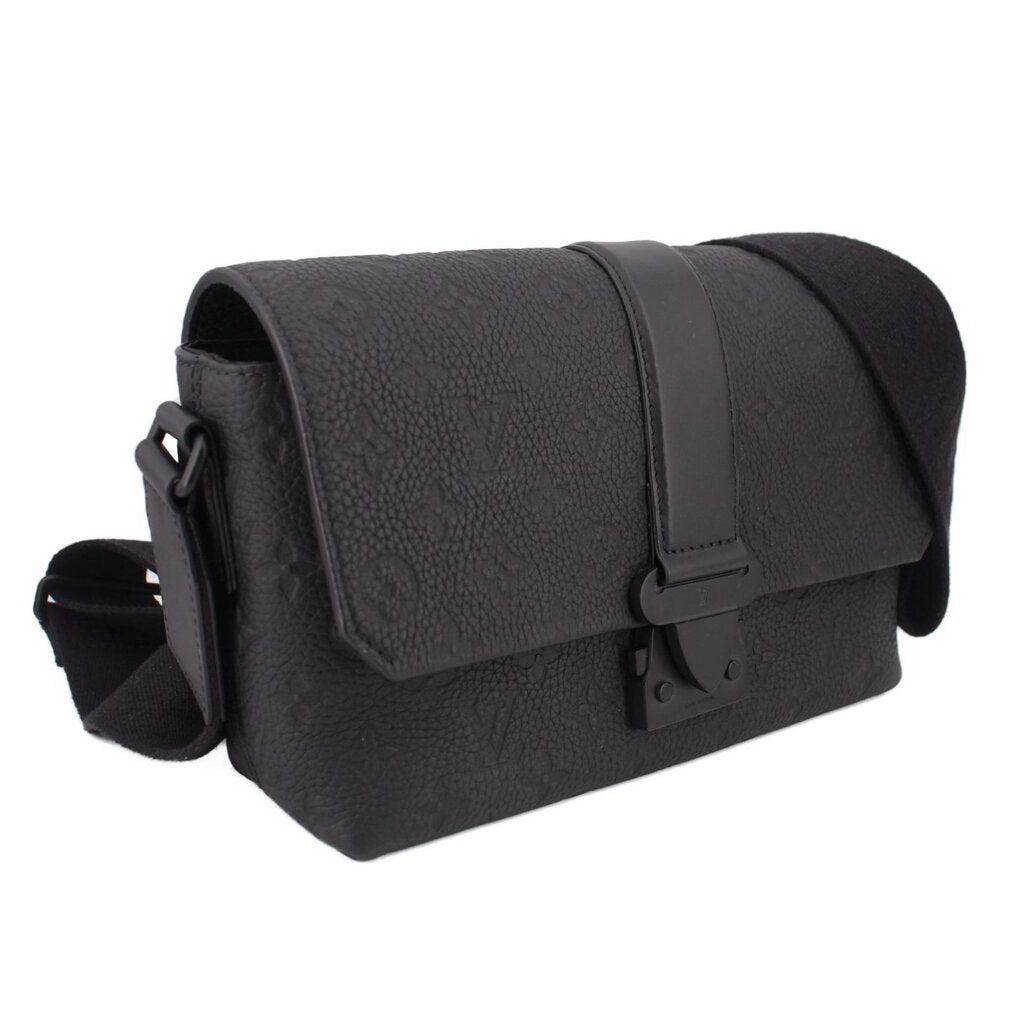 Black leather crossbody messenger bag with flap and side strap loop