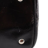 Black leather-look tote panel with snap button and top edge stitching