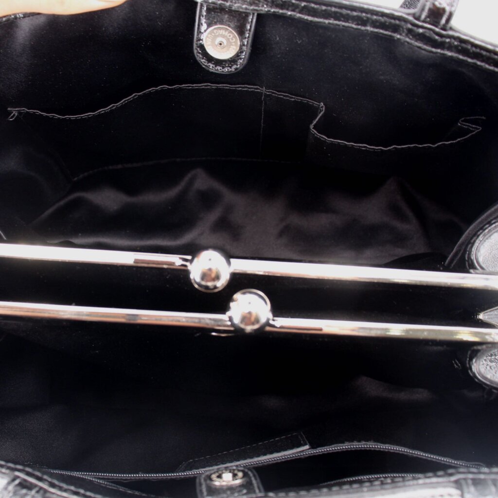 Tote interior with kisslock turn-lock hardware and fabric lining