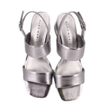 Pewter metallic leather heeled sandals with open toe and ankle straps with buckles
