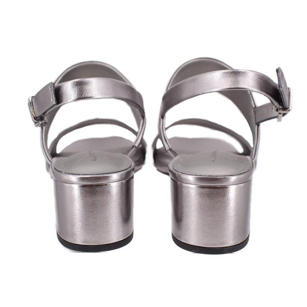 Pewter metallic leather heeled sandals from back view with adjustable ankle straps