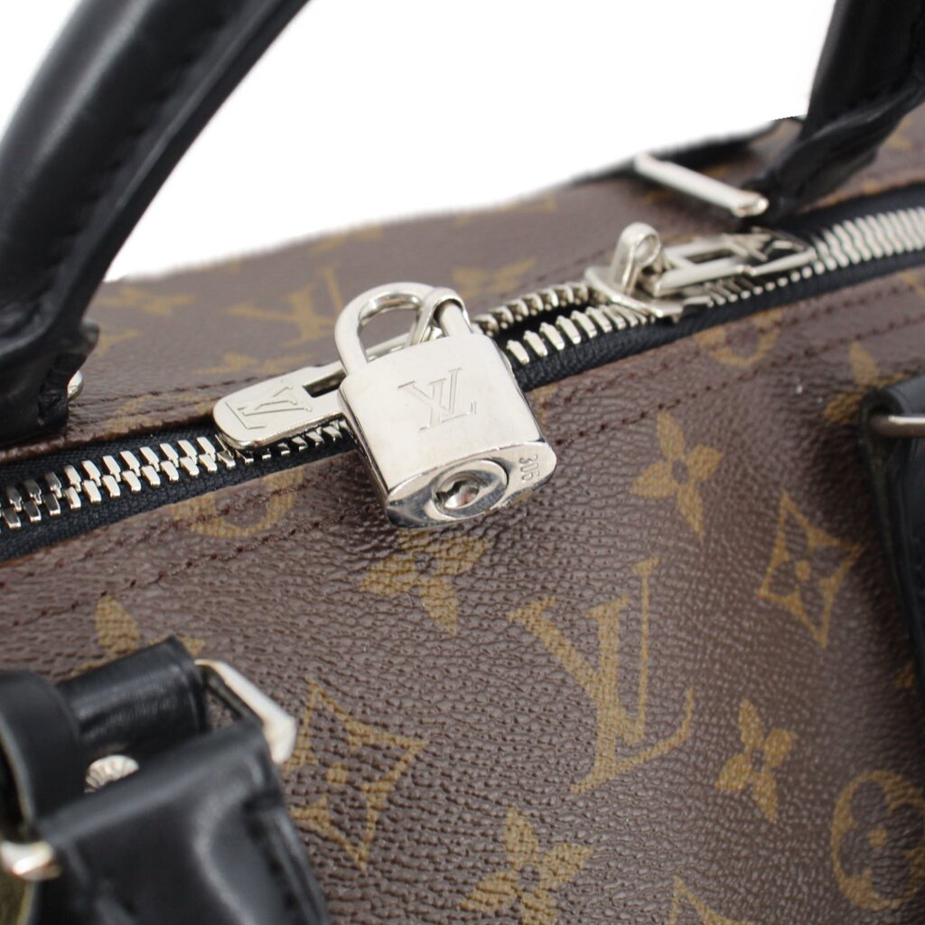 Monogram Keepall 55 travel bag zip with metal lock and zipper pull