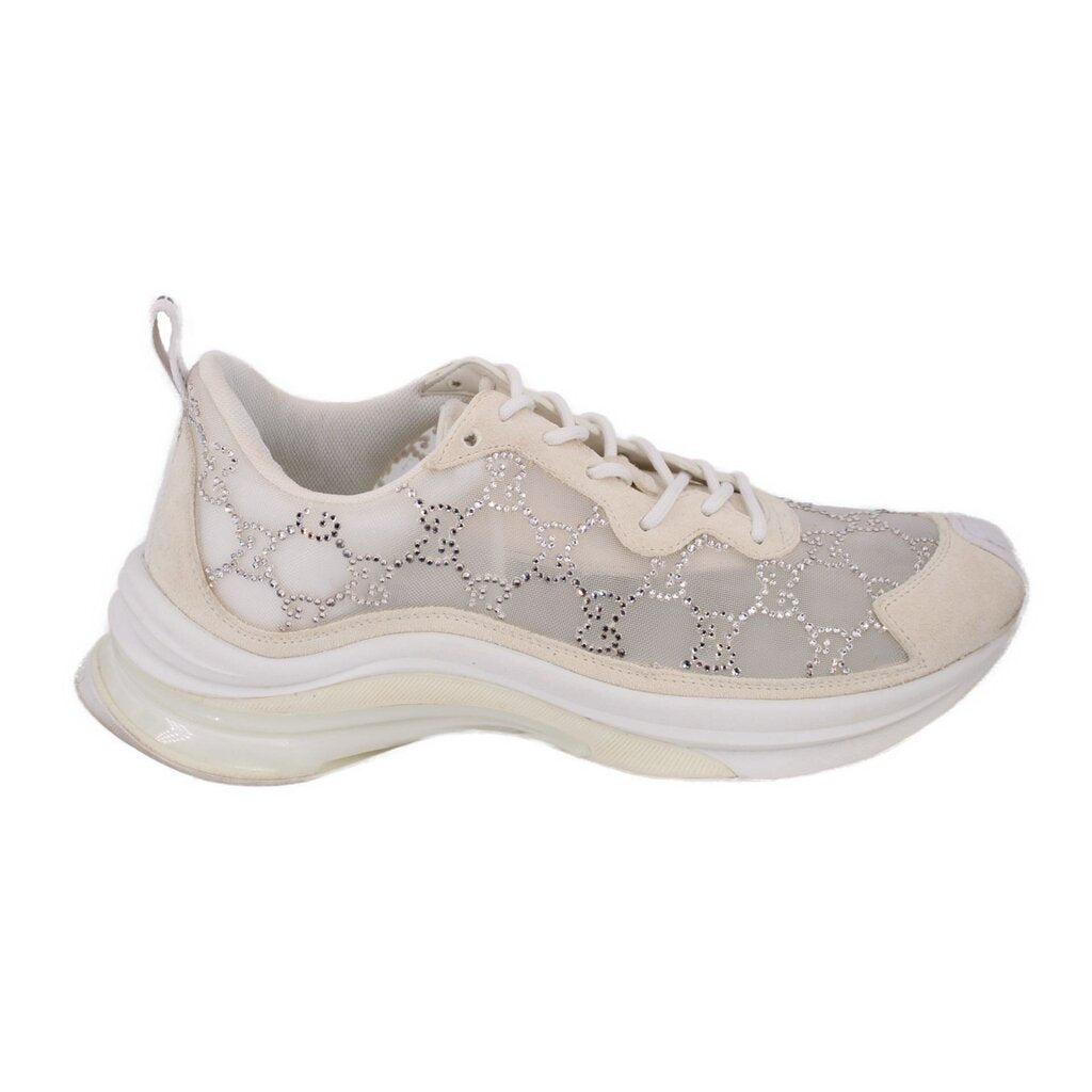 Crystal-studded running sneaker with beige upper, white lace-up, chunky white sole