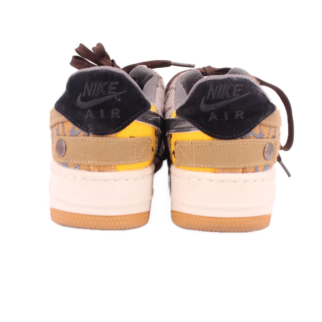 Women’s Nike Air sneakers, dark heel tabs with tan and yellow heel accents