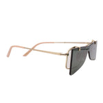 Gold flip-up sunglasses, side view with dark tinted lens and adjustable hinge
