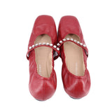 Red leather ballet flats with jewel-trim toe openings; WEITZMAN logo inside.