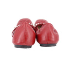 Back view of red leather ballet flats with rhinestone trim at the instep.
