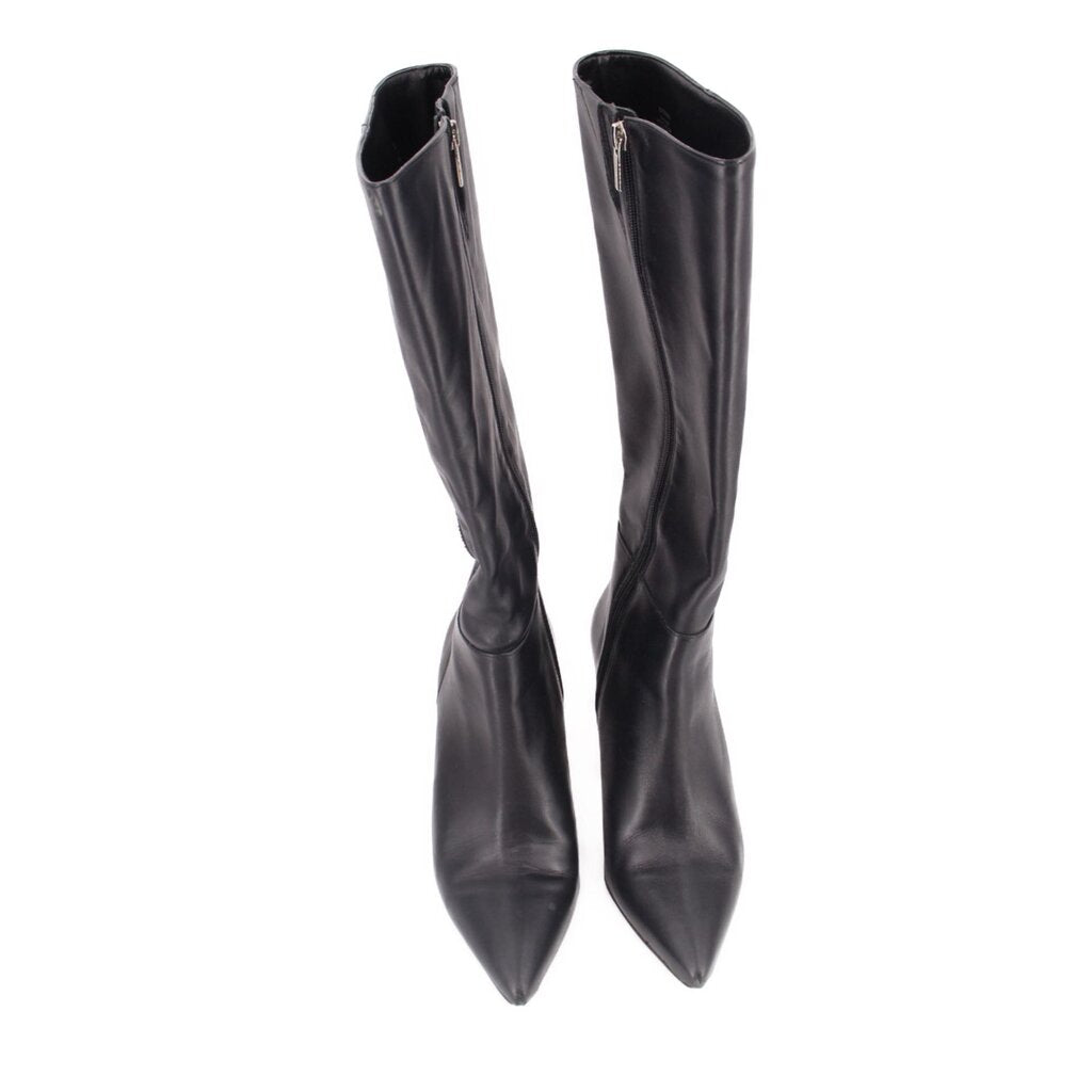 Pair of black knee-high heeled boots with narrow pointed toe