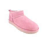 Pink suede ankle booties with stitched seam and low platform sole