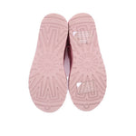 Pink suede ankle booties with patterned rubber outsole tread
