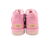 Pink suede ankle booties with back label and plush trim