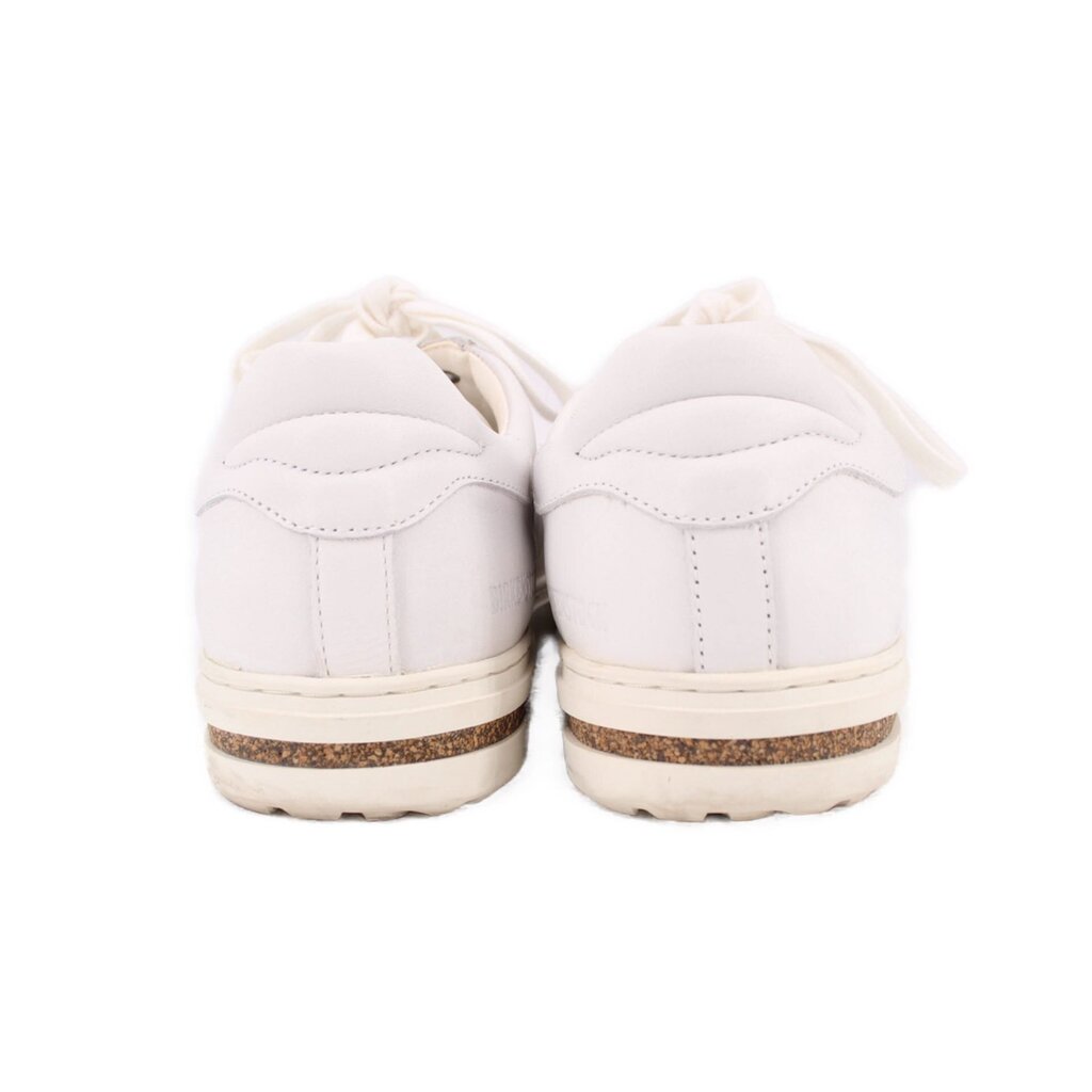 BIRKENSTOCK leather sneakers in white, heel view with tan-speckled sole