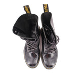 Black lace-up boots with plush lining and yellow logo text on tongue