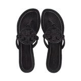 Black knotted thong sandals viewed from above, open toe and footbed