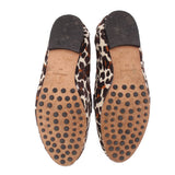Leopard-print felt loafer bottoms with dotted rubber tread and brown interior