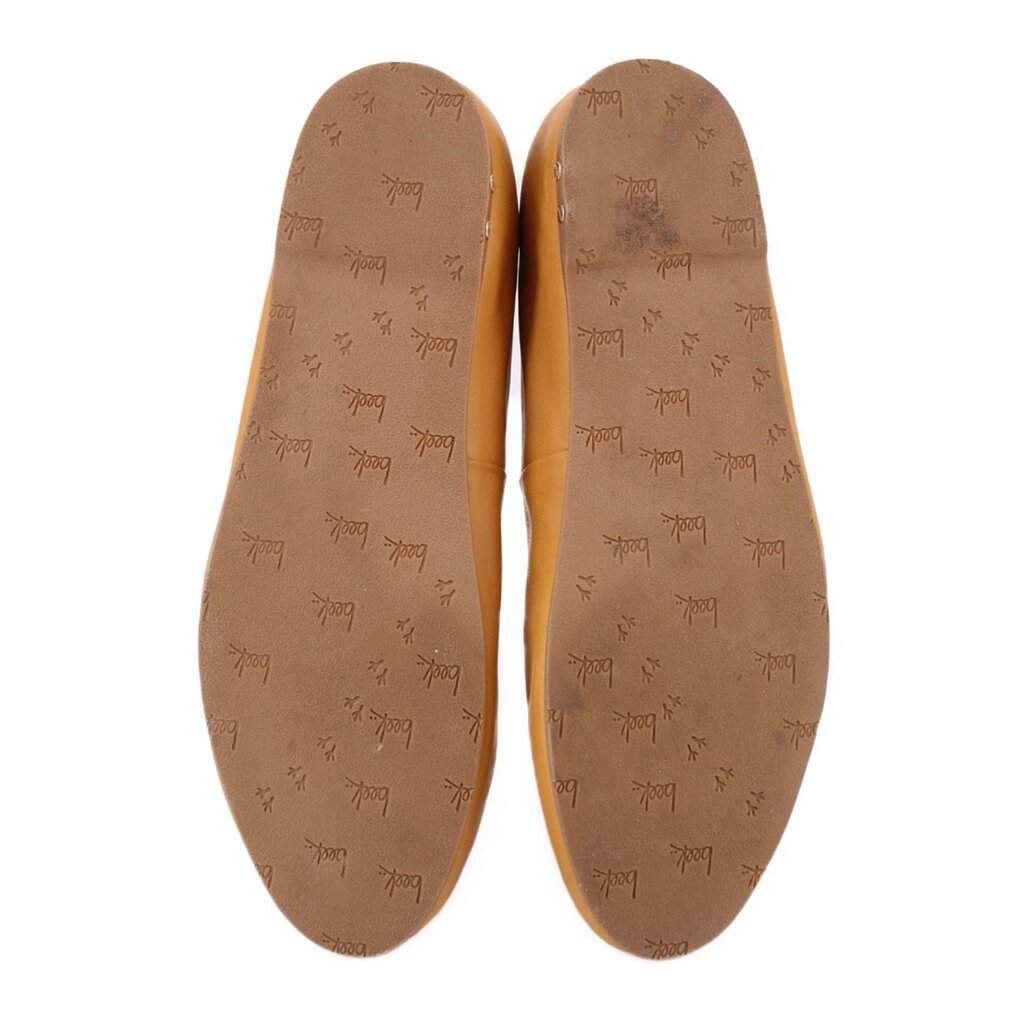 Yellow leather flat insides with patterned logo print on footbed