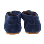 Blue suede loafers rear view with stitched heel and tan sole edge