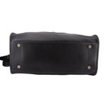 Telfar medium carry shoulder bag in black pebbled leather, back panel with hardware snaps