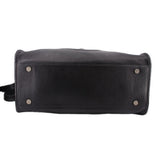 Telfar medium carry shoulder bag in black pebbled leather, back panel with hardware snaps
