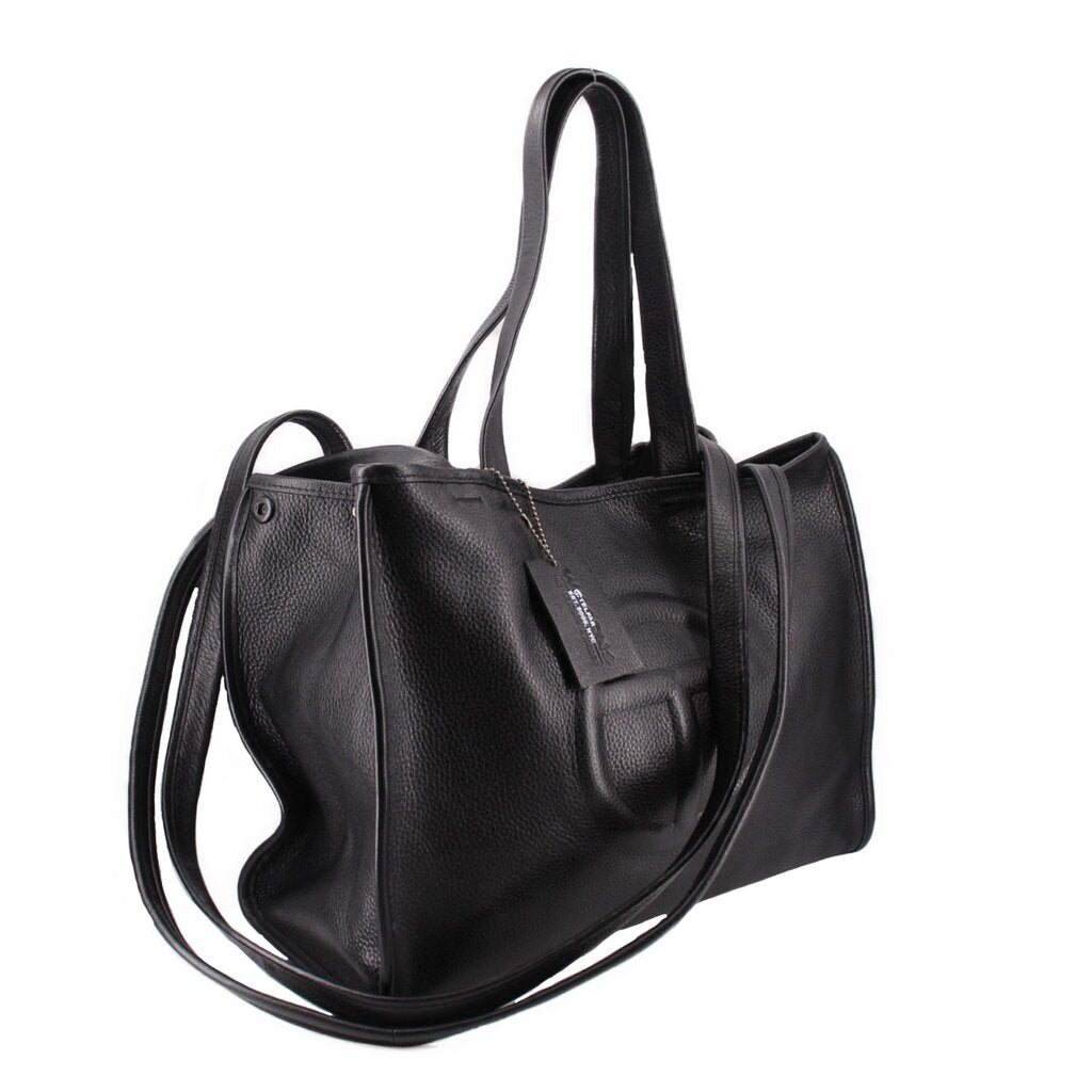 Telfar medium carry shoulder bag in black pebbled leather, side view with long strap