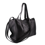 Telfar medium carry shoulder bag in black pebbled leather, side view with long strap