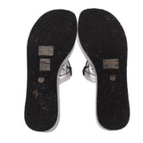 Black patterned outsoles for silver platform wedge sandals, toe and heel pads.