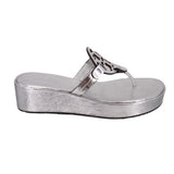 Silver platform wedge sandals with openwork logo strap and T-thong front.