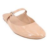 Tan patent flats with T-strap and rhinestone buckle detail, rounded toe
