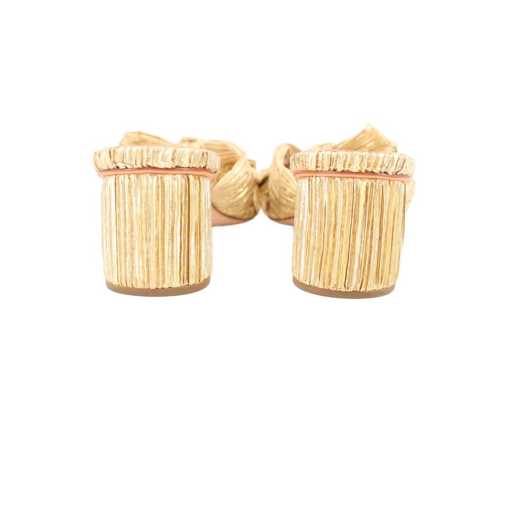 Gold woven heeled slide sandal showing back view of block heels