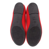 Red flats bottom view with textured black outsole and VIVIA branding