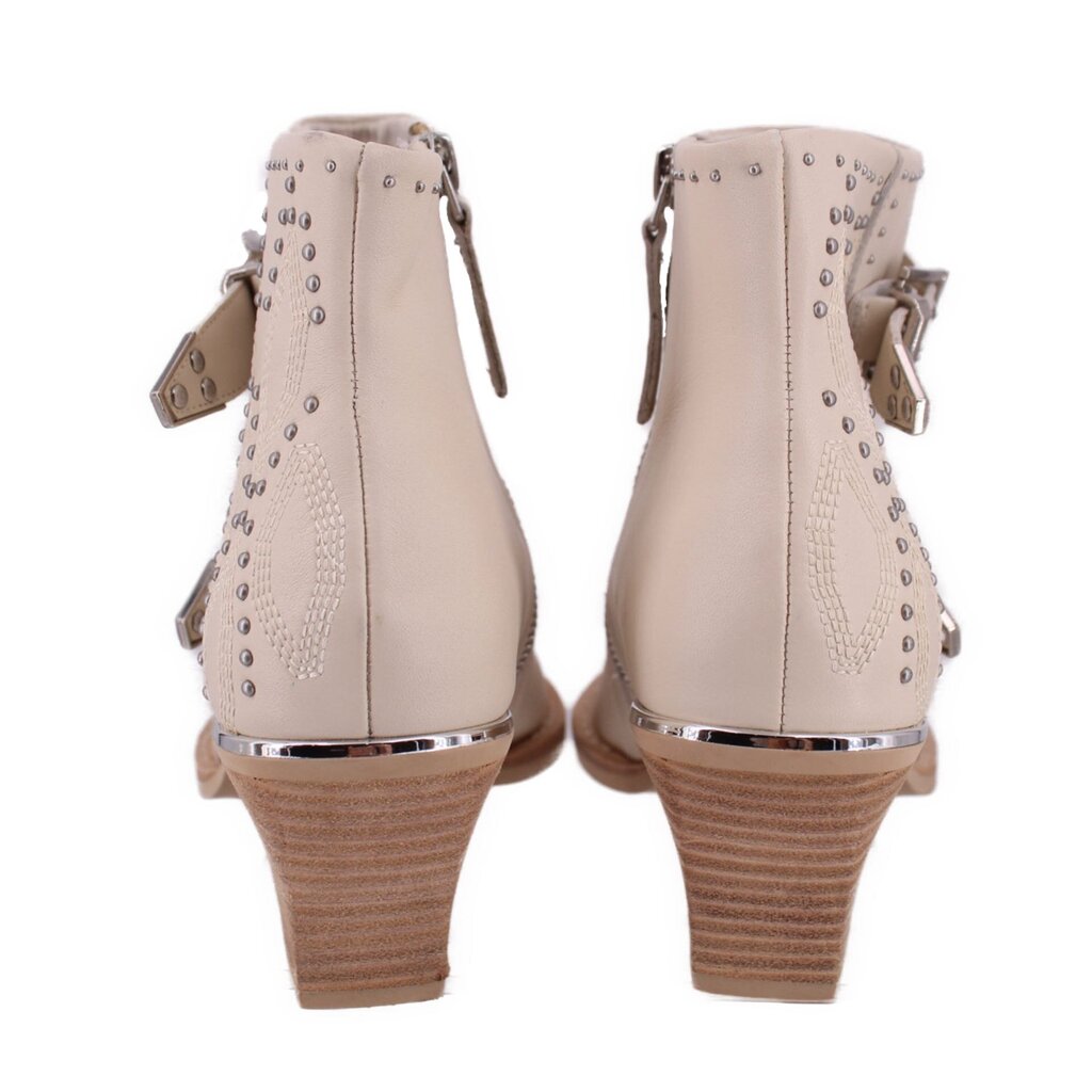 Cream studded ankle boot with side zipper and stacked wedge heel, rear view