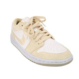 Women's low-top sneakers in tan with white leather panels and lace-up front