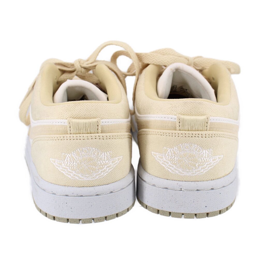 Women's low-top sneakers, tan with white heel logo and lace loops, rear view