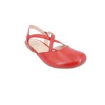Red leather flats with crisscross ankle straps and low sole