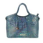Blue embossed leather satchel with top handles and front tab detail