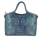 Blue embossed leather satchel with top handles, emblem patch, and snap closure
