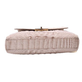 Cream embossed leather crossbody bag with back panel and small metal logo tab.
