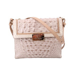 Cream embossed leather crossbody bag with logo plaque and adjustable strap.