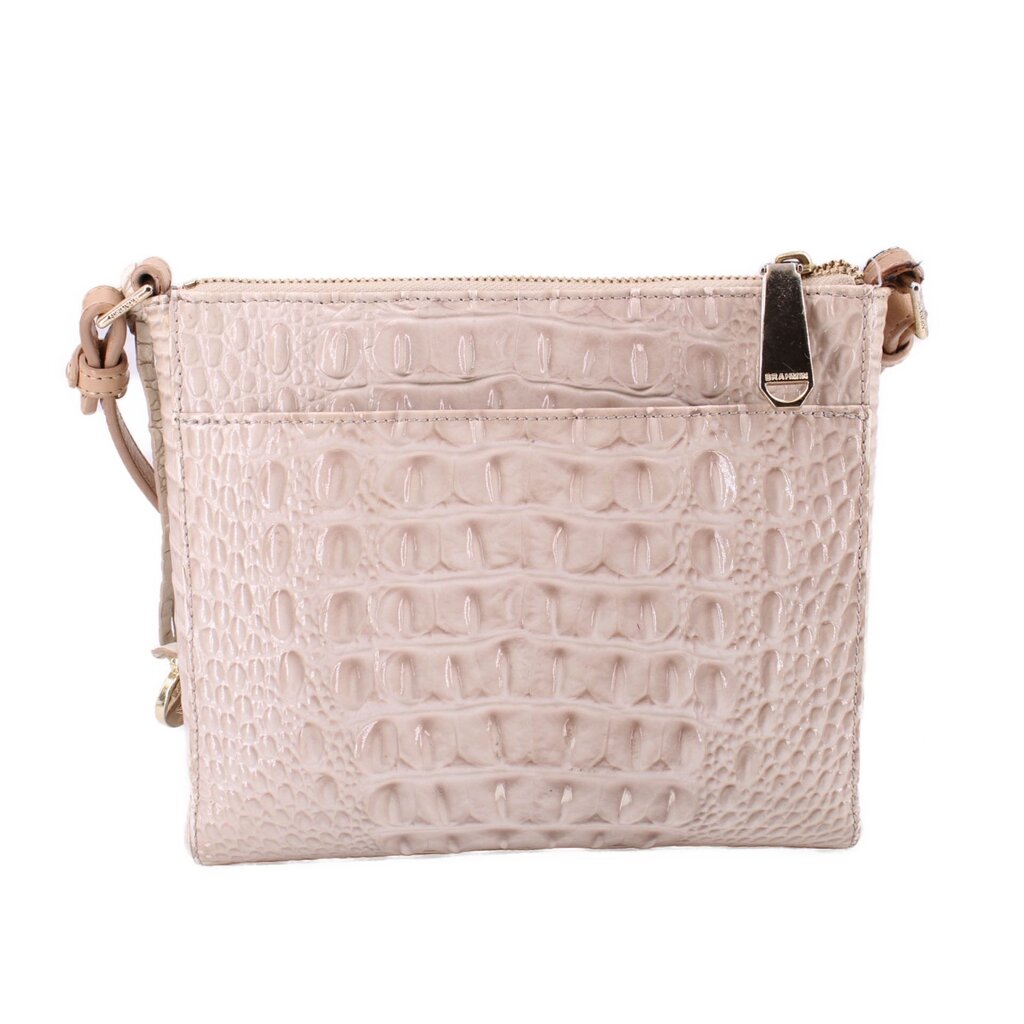 Cream embossed leather crossbody bag with zip closure and top carry loop detail.