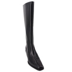 Black tall leather boots with pointed toe and low block heel