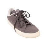 Adidas mid-top sneakers in dark gray suede with black laces and off-white rubber sole