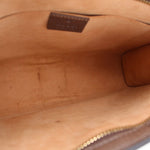 GUCCI Ophidia pouch interior view, tan lining and zipper opening