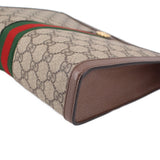 GUCCI Ophidia pouch corner close-up on brown base edge and GG canvas