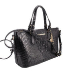 Black croc-embossed mini satchel bag with top handles, crossbody strap, gold-tone hardware