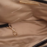 Mini satchel interior lining with patterned logo and gold-tone clasp hardware