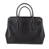 BRAHMIN black croc-embossed tote with top handles, front keychain tag, and gold accents