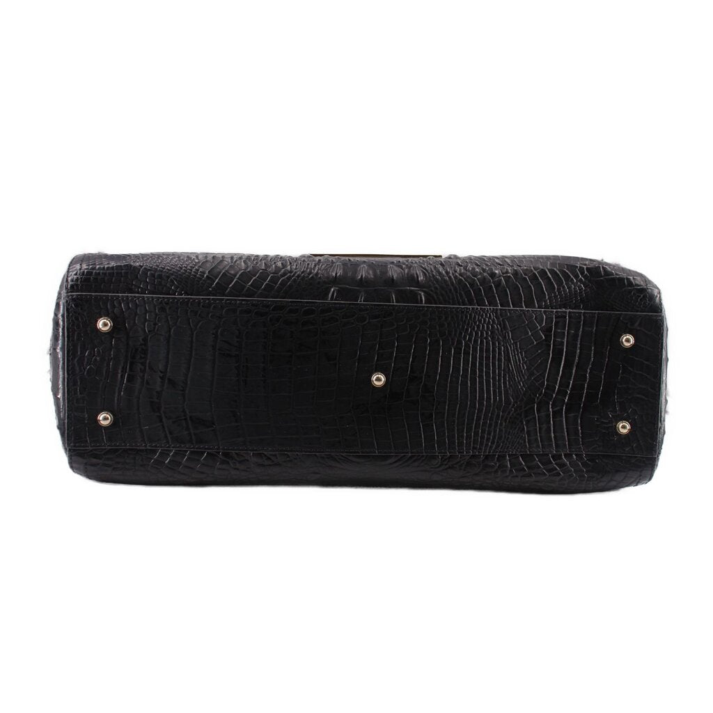 BRAHMIN black croc-embossed tote side view with reinforced base and metal studs